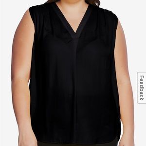 Sleeveless black blouse